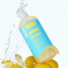 Bliss Soapy Suds Body Wash bottle with lemon and sage decor