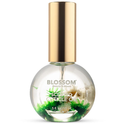 Blossom Cuticle Oil 0.5 fl. oz Lemon Cookie front view with real flowers