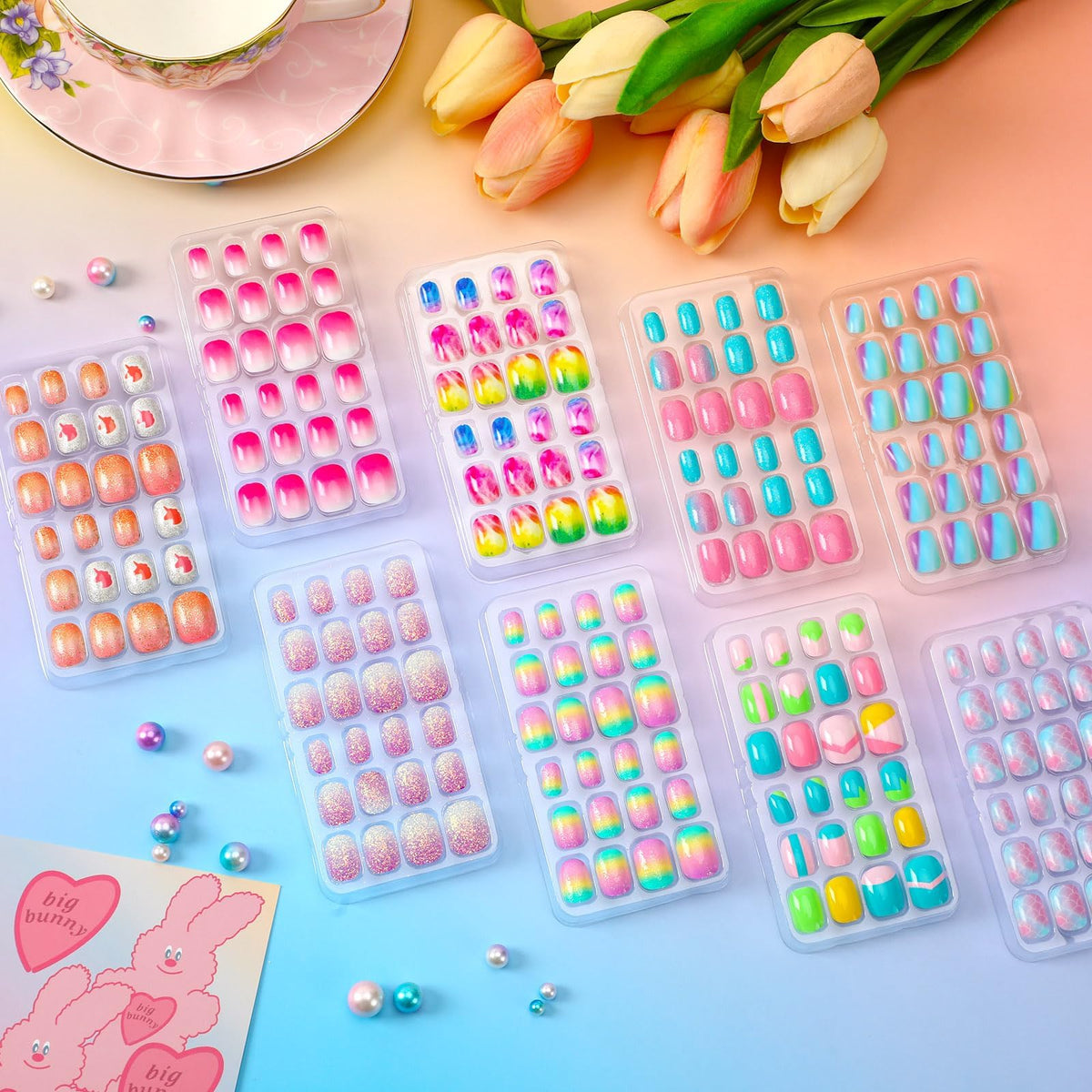 BOARDFEB Kids Press On Nails 216 Pcs close-up of sticker application process