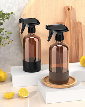 Bontip Amber Glass Spray Bottle set on a wooden table