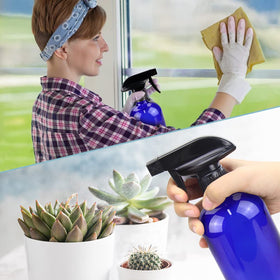 Bontip Blue Glass Spray Bottle in use watering plants