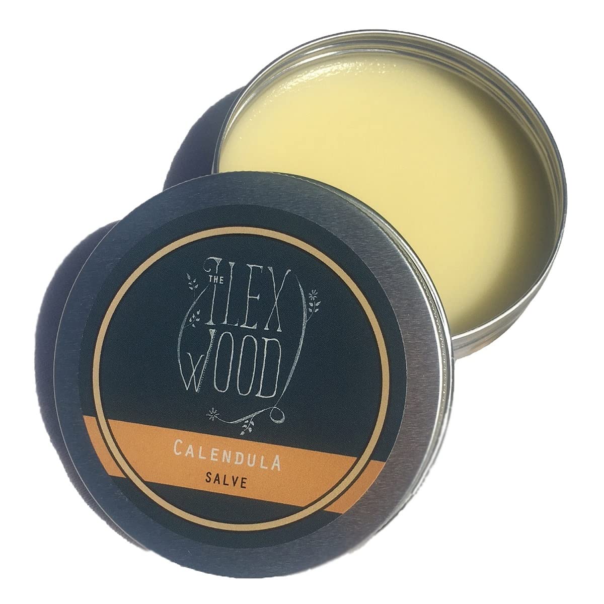 Boo Boo Balm jar with natural ingredients displayed