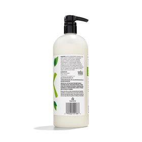 Bottle of 365 Body Wash with Aloe & White Tea on a bathroom shelf