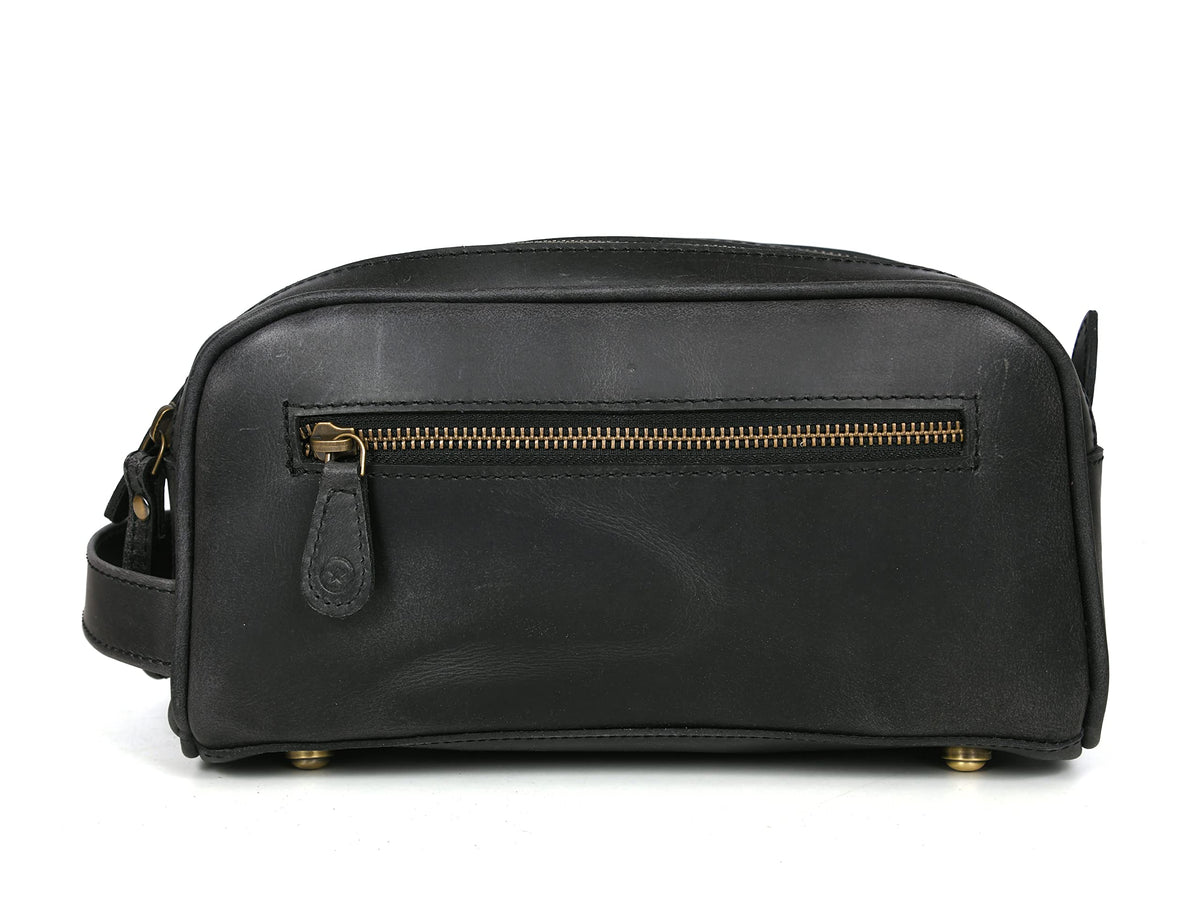 Bottom view of AARON LEATHER GOODS leather toiletry pouch with metal studs
