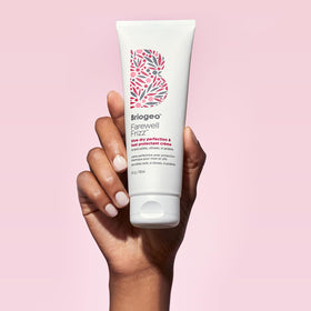 Briogeo Farewell Frizz Blow Dry Crème in a bathroom setting