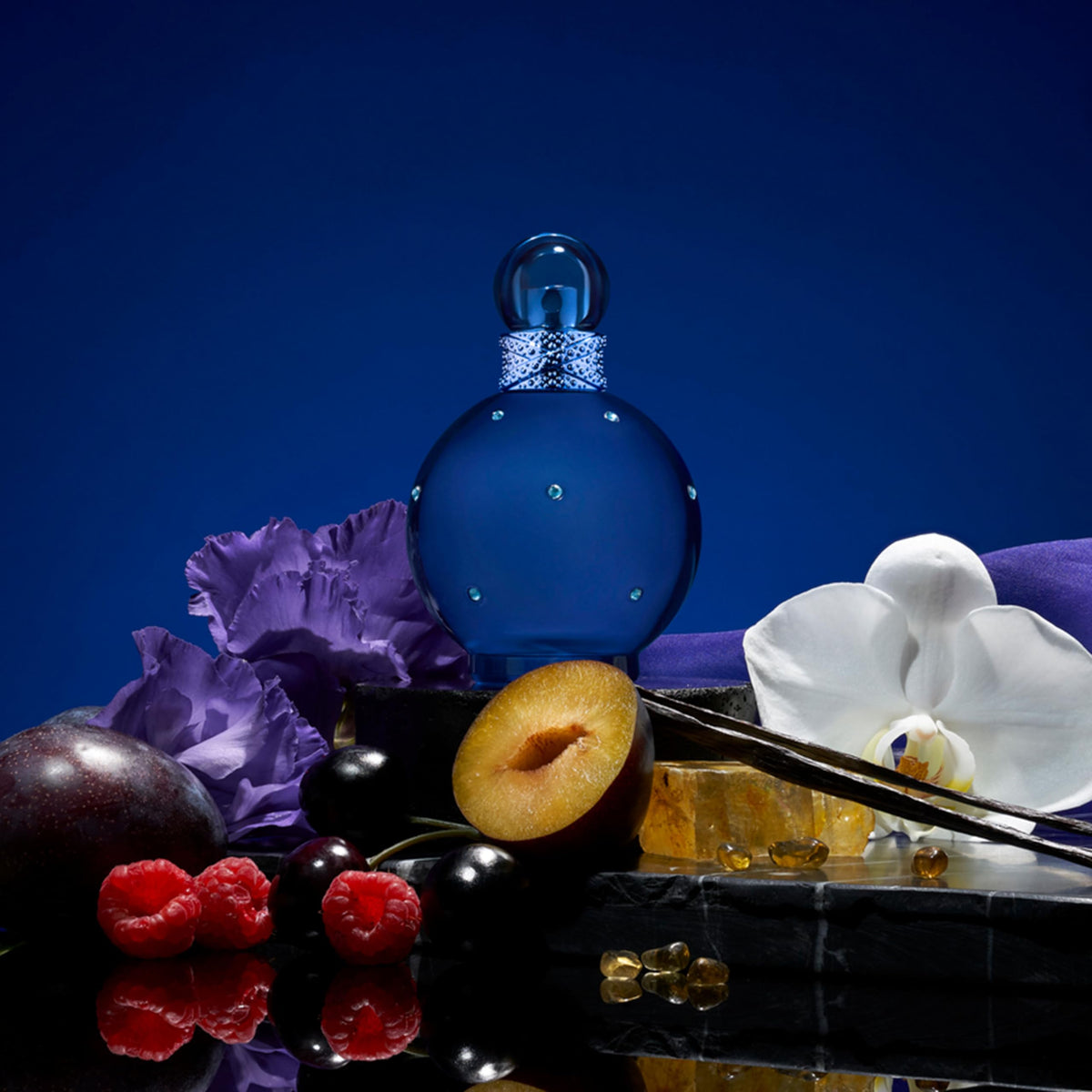 Britney Spears Midnight Fantasy bottle with flowers