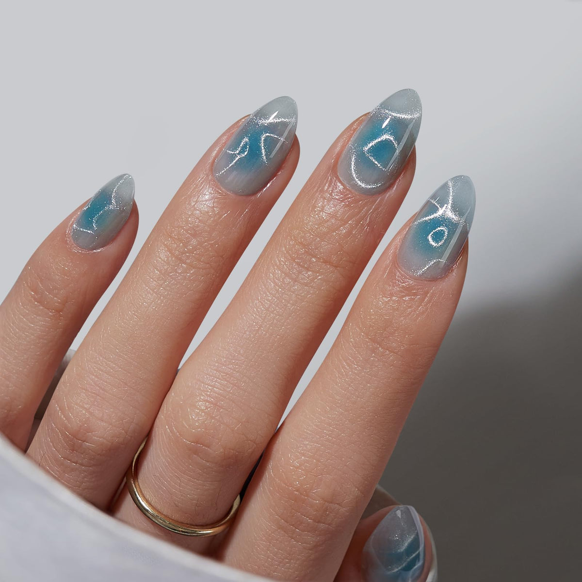 BTArtbox Press On Nails Blue Mirage front view with sparkly design
