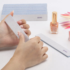 BTYMS nail file on a manicure table with tools