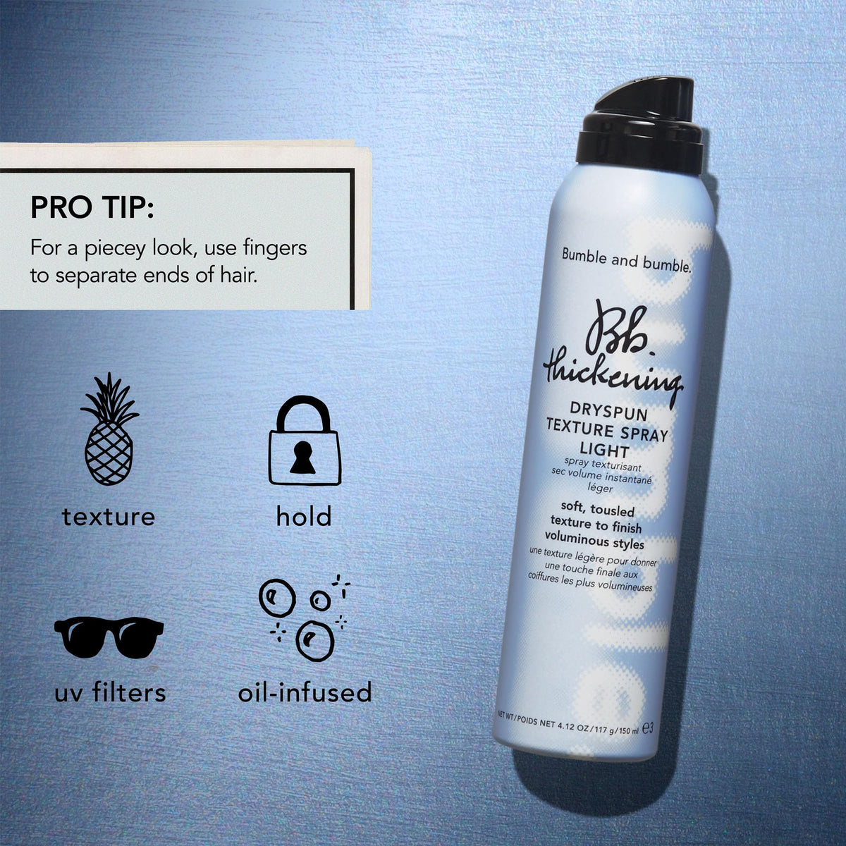 Bumble and bumble. Thickening Dryspun Texture Spray Mini on a vanity