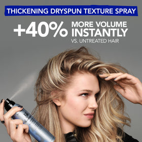 Bumble and bumble. Thickening Travel-Size Hair Set displayed with travel accessories