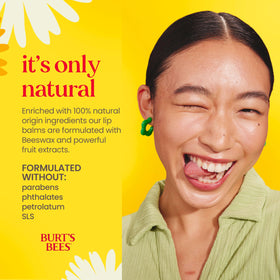 Burt's Bees Coconut and Pear Lip Balm with tropical background