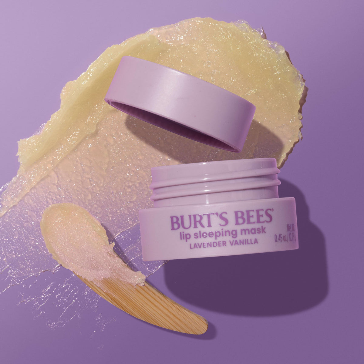 Burt's Bees Lavender Vanilla Lip Sleeping Mask jar with lavender flowers
