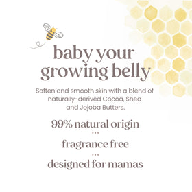 Burt's Bees Mama Belly Butter on a bedside table