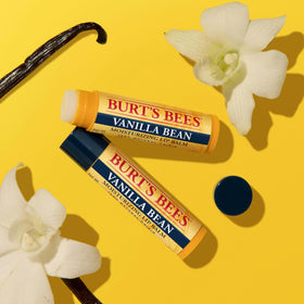 Burt's Bees Vanilla Bean Lip Balm on a bathroom shelf
