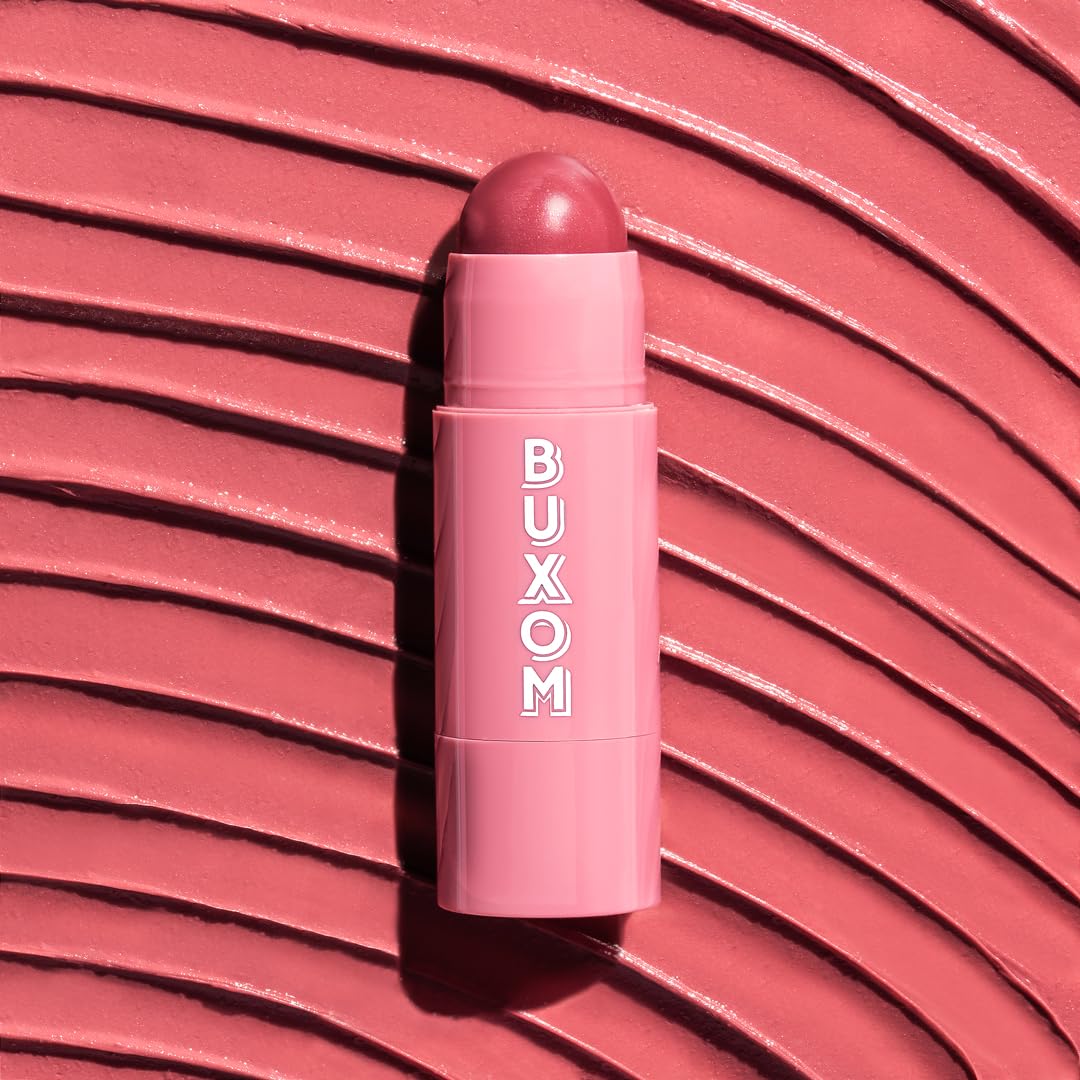 Buxom Power-Full Plump Tinted Lip Balm Dolly Fever in hand