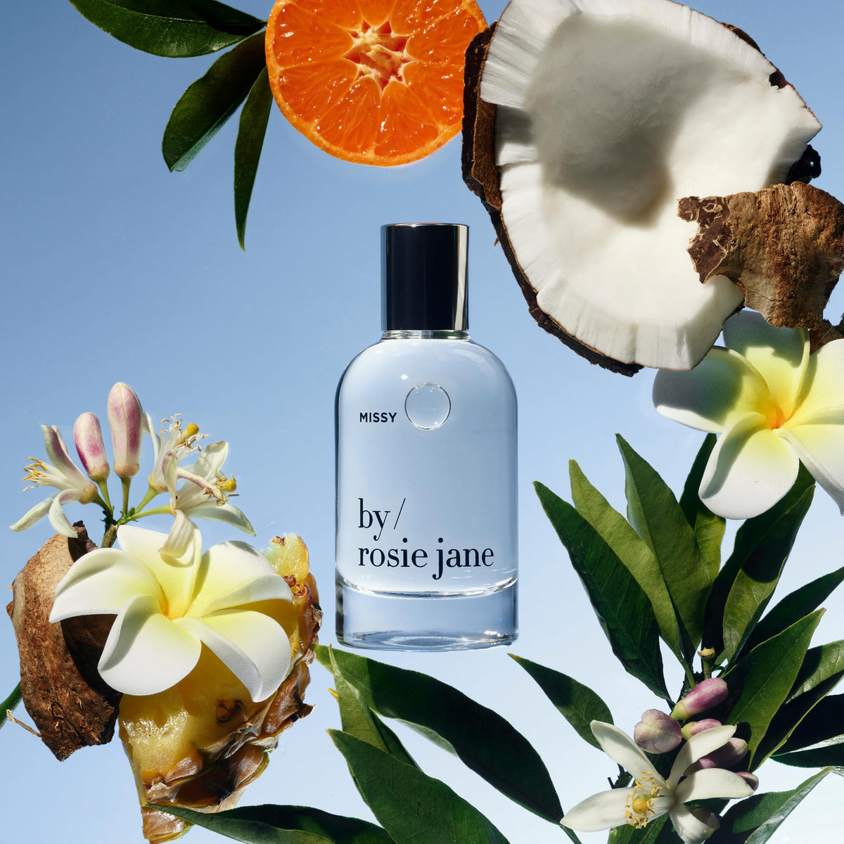By Rosie Jane Missy Eau De Parfum bottle with tropical background