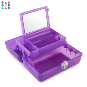 Caboodles On-The-Go Girl Makeup Box shown in a travel setting