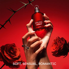 Cacharel Amor Amor Eau De Toilette gift set displayed on a decorative surface