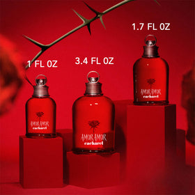 Cacharel Amor Amor Eau de Toilette with floral background