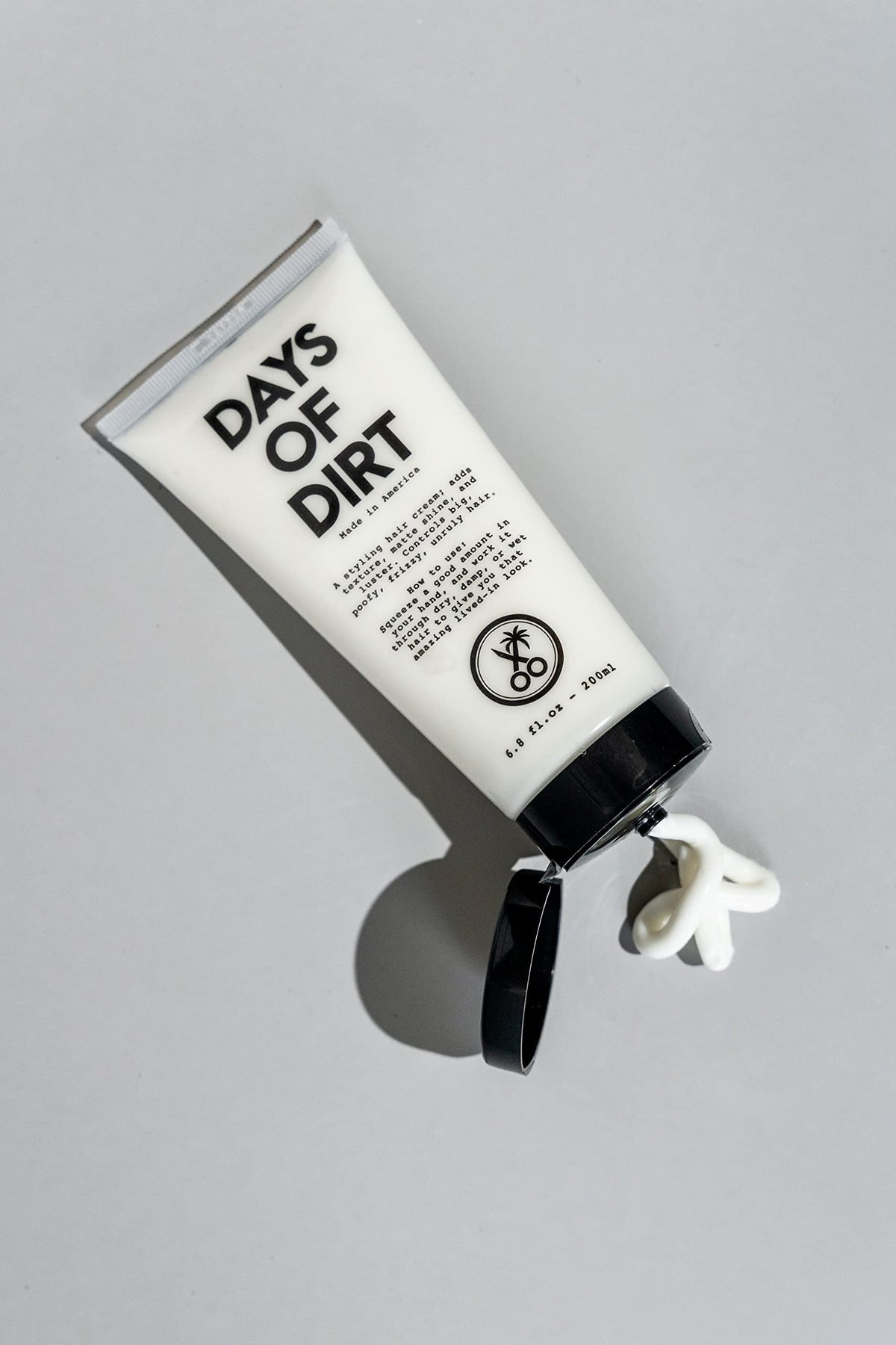 California Born Days of Dirt Hair Styling Cream packaging with travel-friendly tube