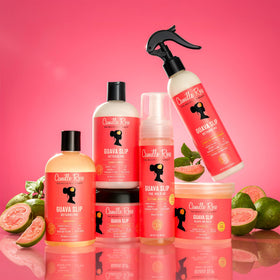 Camille Rose Guava Slip Shampoo in bathroom setting