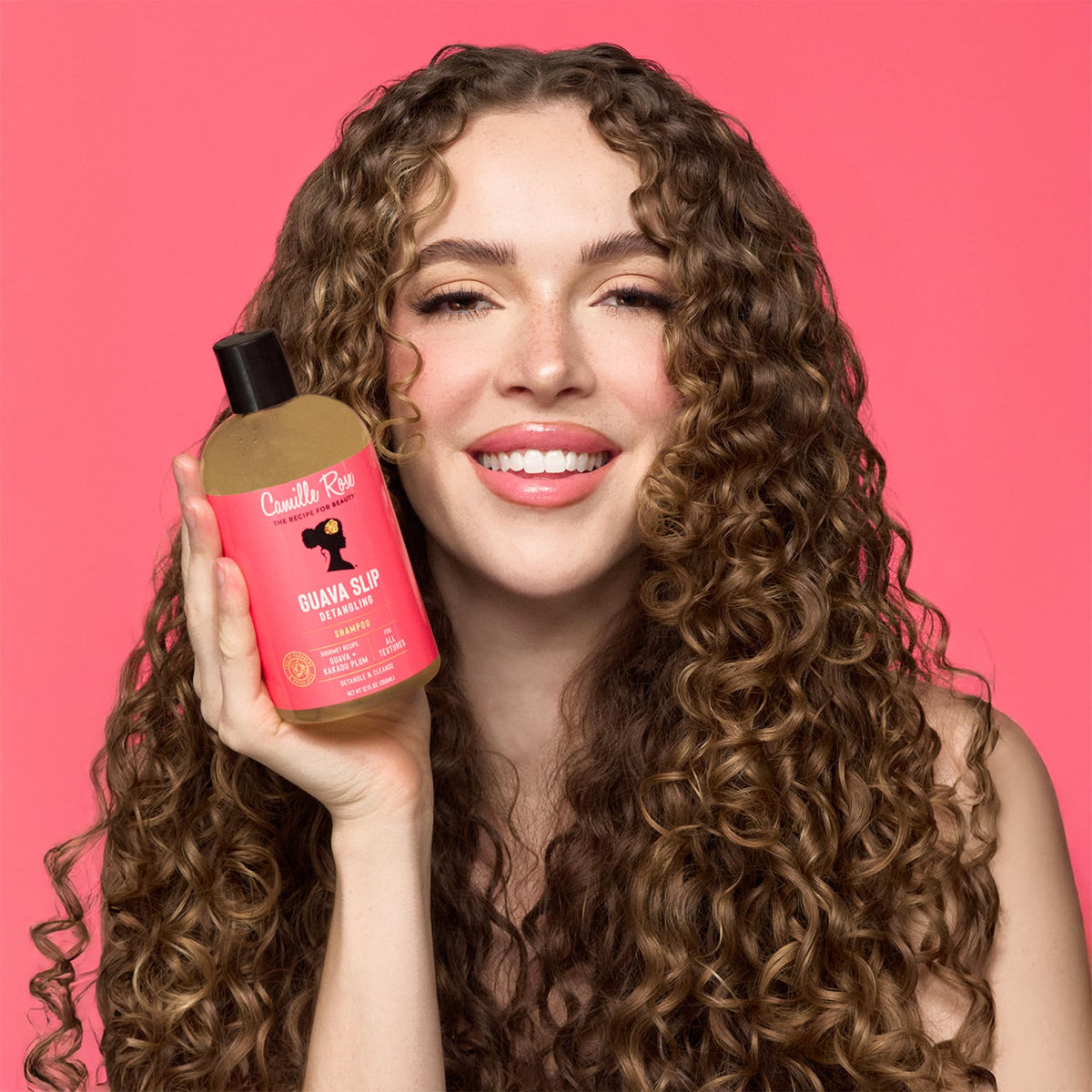 Camille Rose Guava Slip Shampoo texture on hand