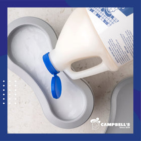 Campbell's Pre-Mixed Shave Cream 64oz pouring into a cup
