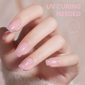 CANNI Jelly Nude Pink Gel Nail Polish under UV lamp