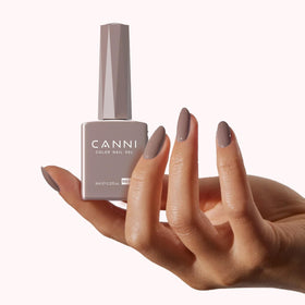 CANNI Light Brown Gel Nail Polish curing under UV lamp