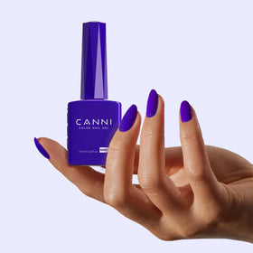 CANNI Royal Blue Gel Nail Polish in salon setting
