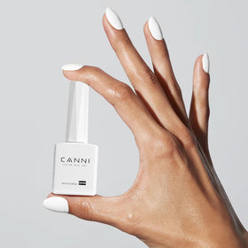 CANNI White Gel Nail Polish curing under UV lamp
