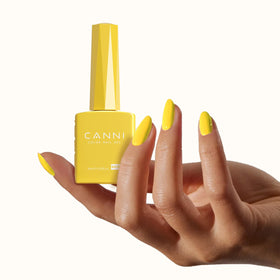 CANNI Yellow Gel Nail Polish curing under UV lamp