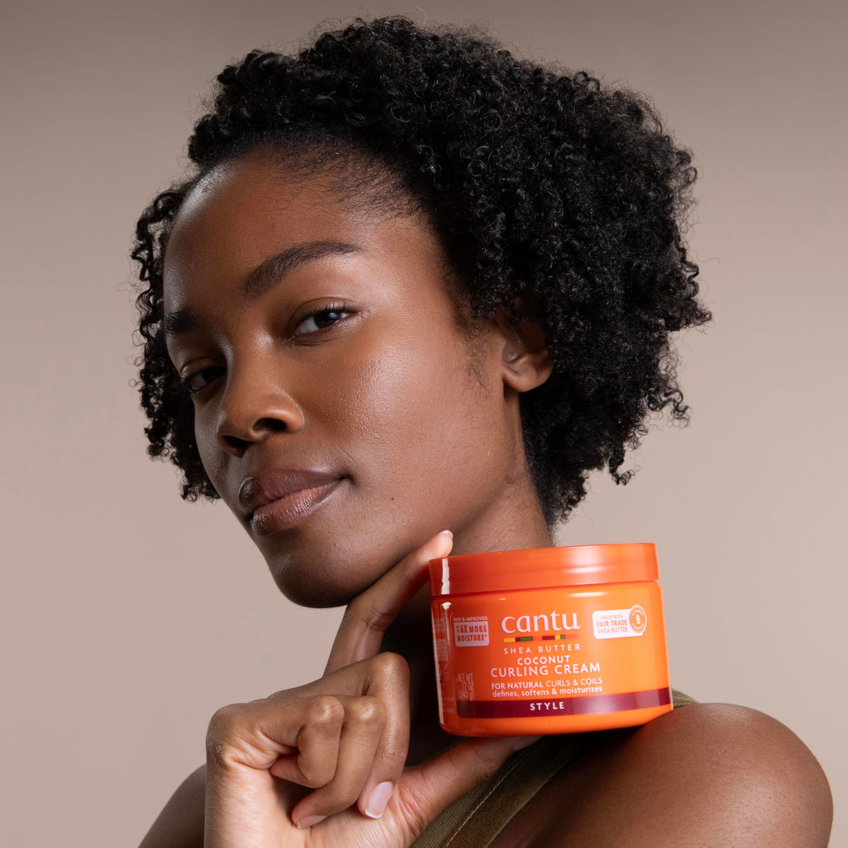 Cantu Coconut Curling Cream 12 oz application on curls