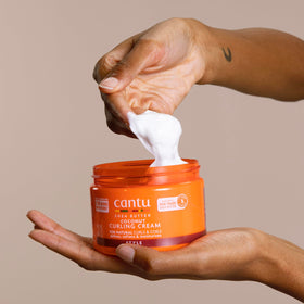 Cantu Coconut Curling Cream 12 oz in use on curly hair