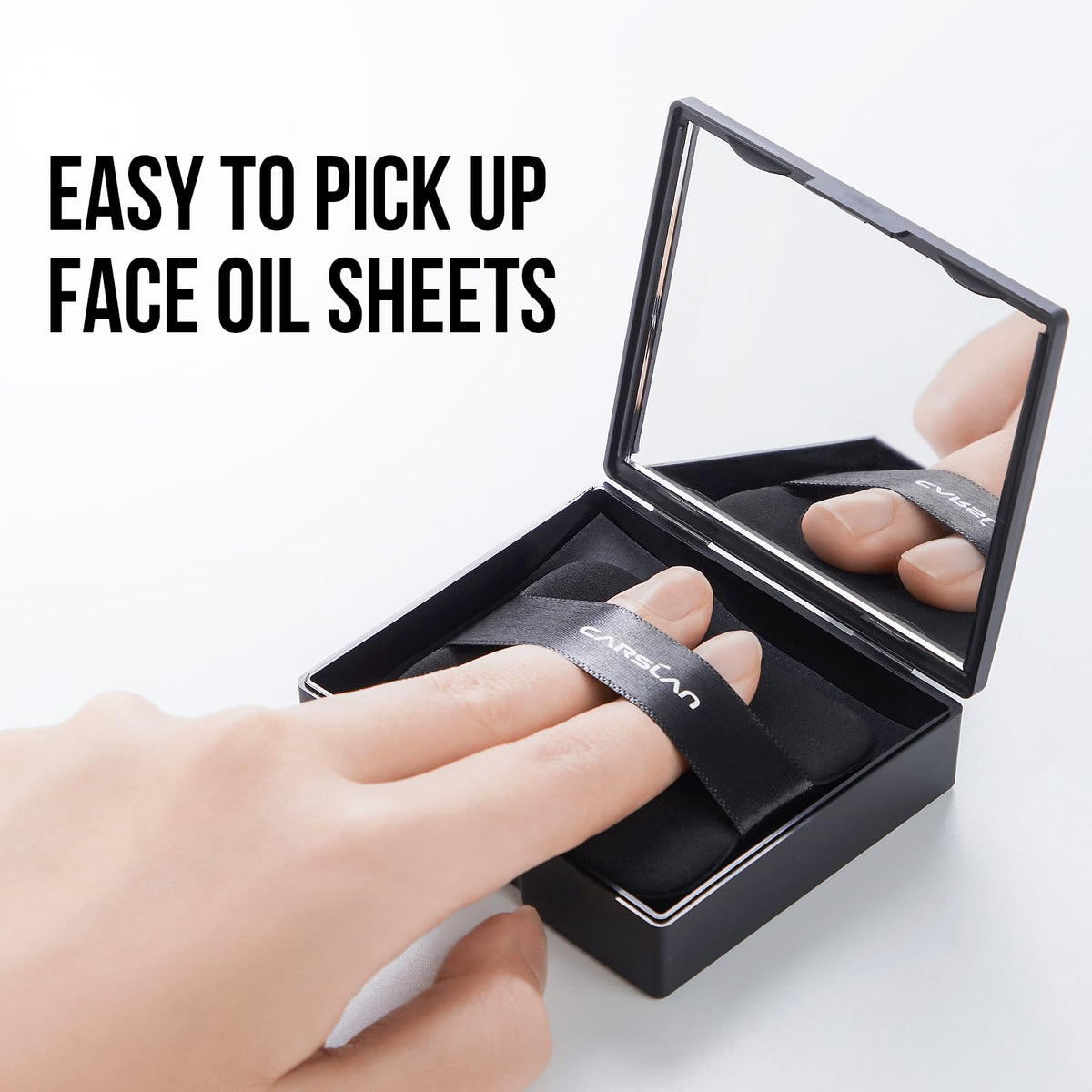 CARSLAN Blotting Paper sheets displayed on a makeup table