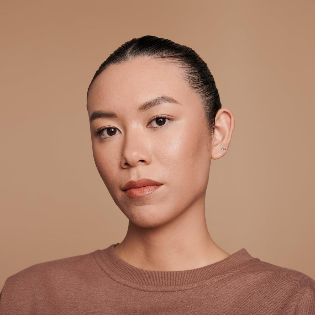 Catrice HD Liquid Coverage Foundation bottle against a white background