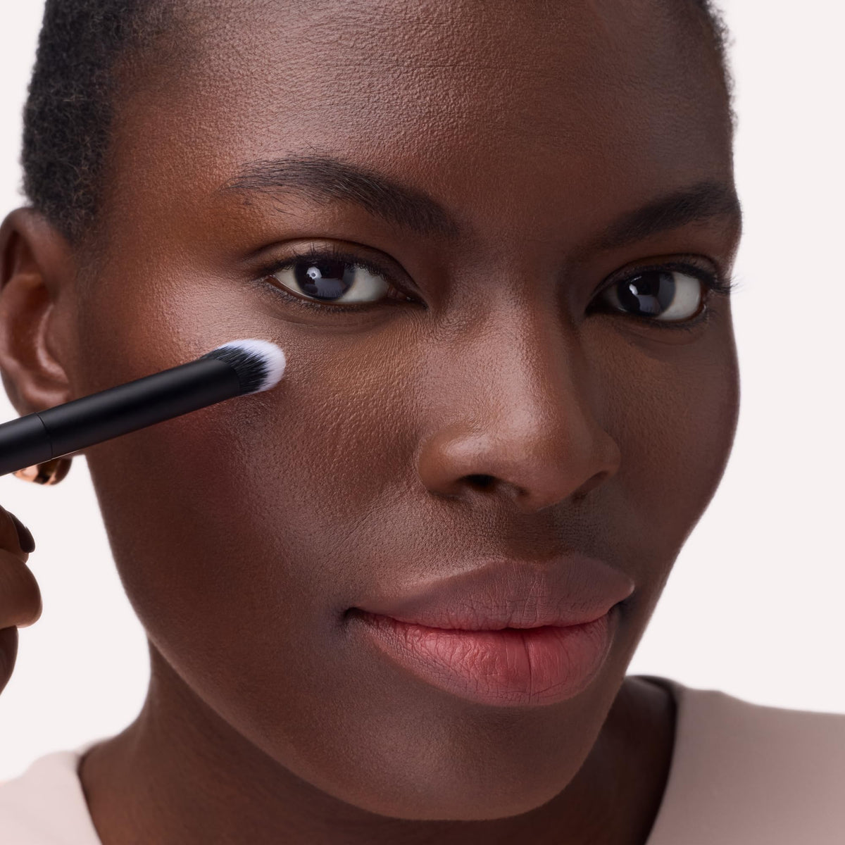 Catrice Under Eye Concealer Brush in a makeup bag for travel