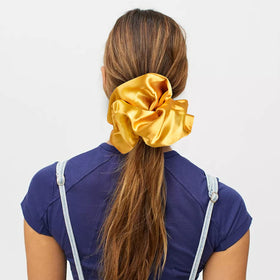 CEELGON blue satin scrunchie in a lifestyle setting
