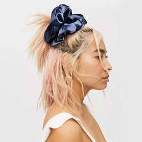 CEELGON champagne satin scrunchie displayed on a table