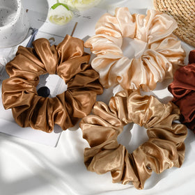 CEELGON large satin scrunchies in various colours displayed together