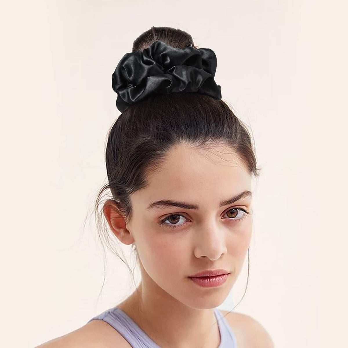 CEELGON large silk scrunchies showing their stretchability