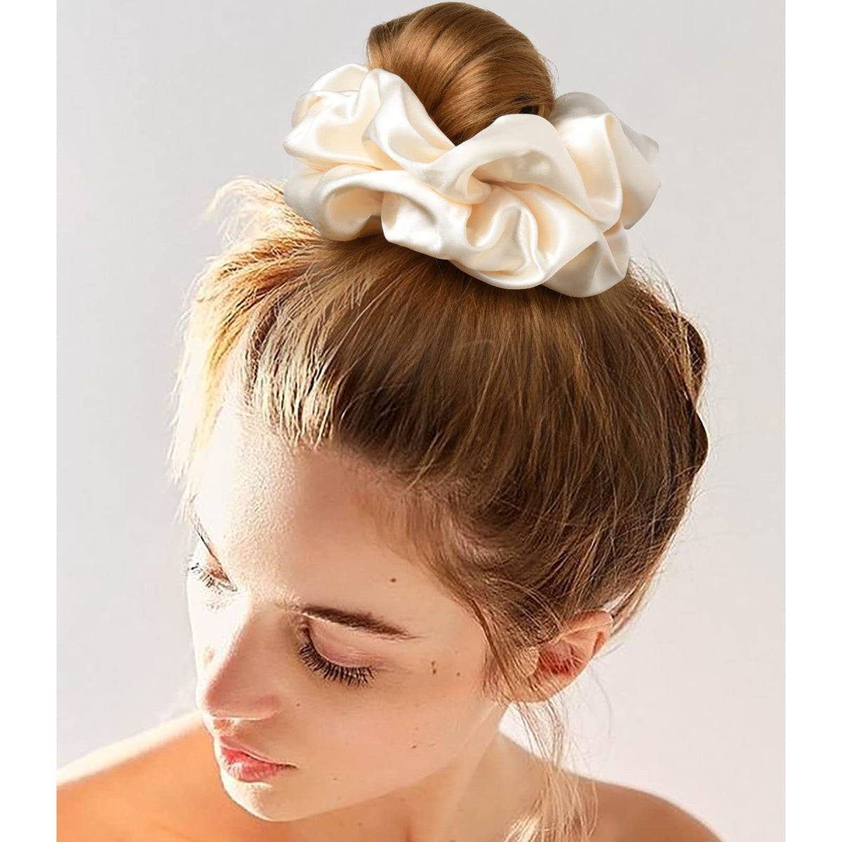 CEELGON scrunchies in use as decorative elements on a bun