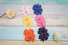 CÉLLOT hair bows in use on a little girl's hair