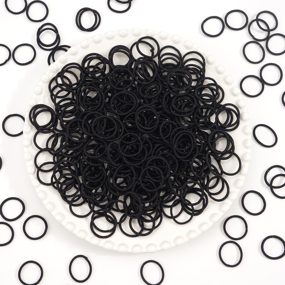 CÉLLOT hair ties being used on a toddler's hair