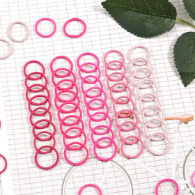 CÉLLOT small hair ties on a table with kids' accessories