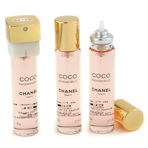 CHANEL Coco Mademoiselle Twist & Spray Eau De Toilette Refill lifestyle scene with flowers
