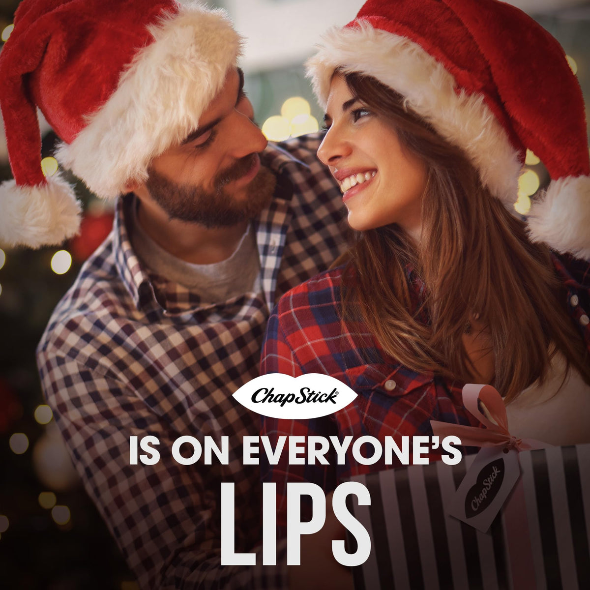 ChapStick Candy Cane Lip Balm on a wooden table