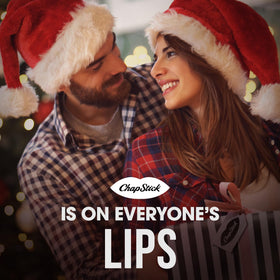 ChapStick Candy Cane Lip Balm on a wooden table