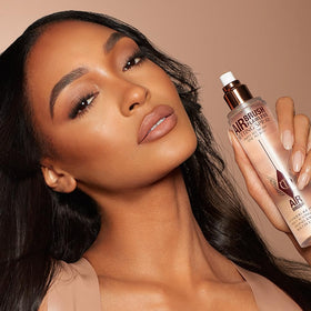 Charlotte Tilbury Airbrush Flawless Setting Spray mist application