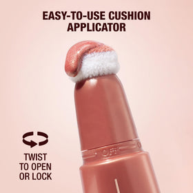 Charlotte Tilbury Beauty Light Wand with makeup brush